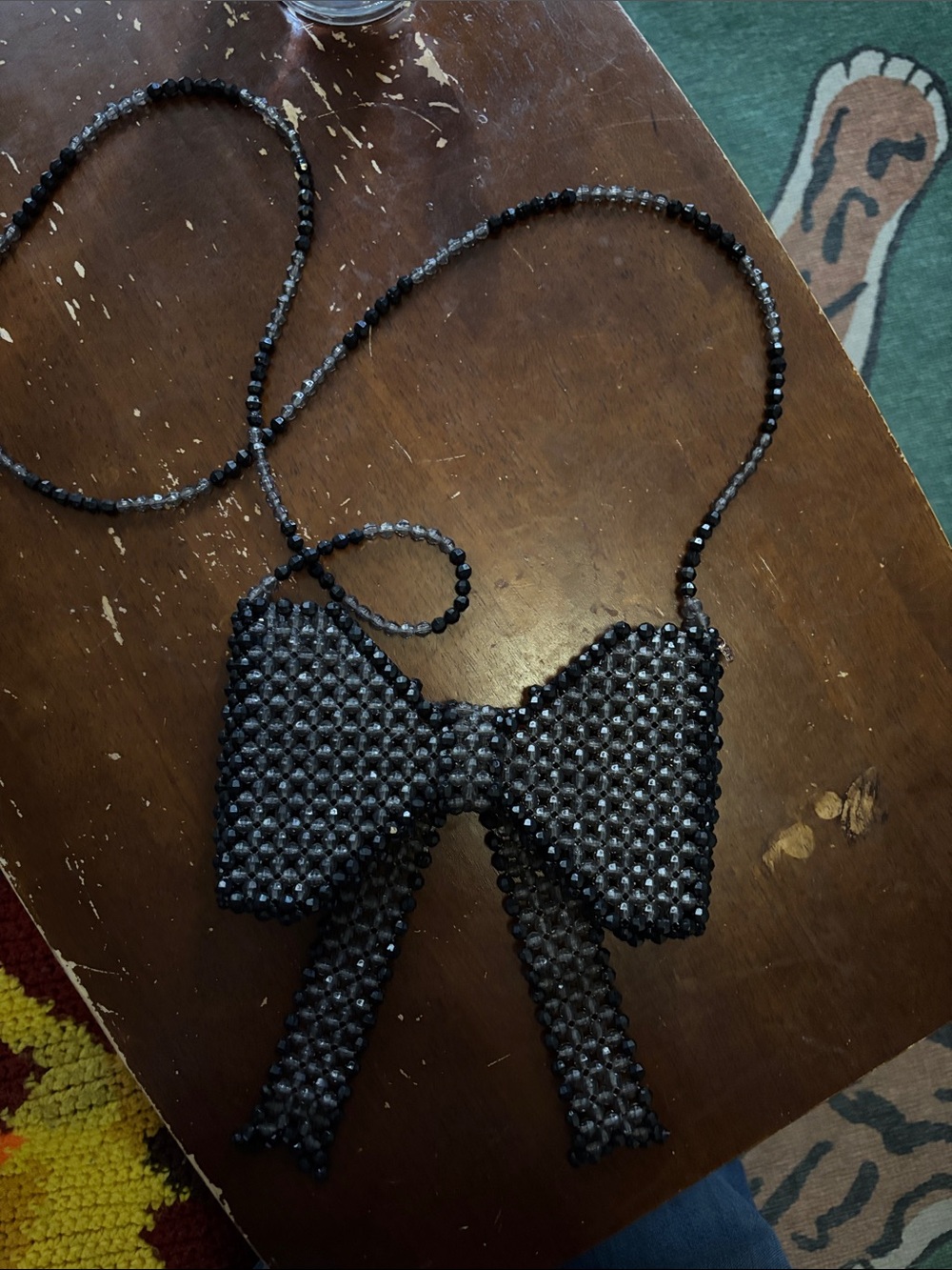 Susan Alexandra Black Beaded Bow Bag with Long Strap